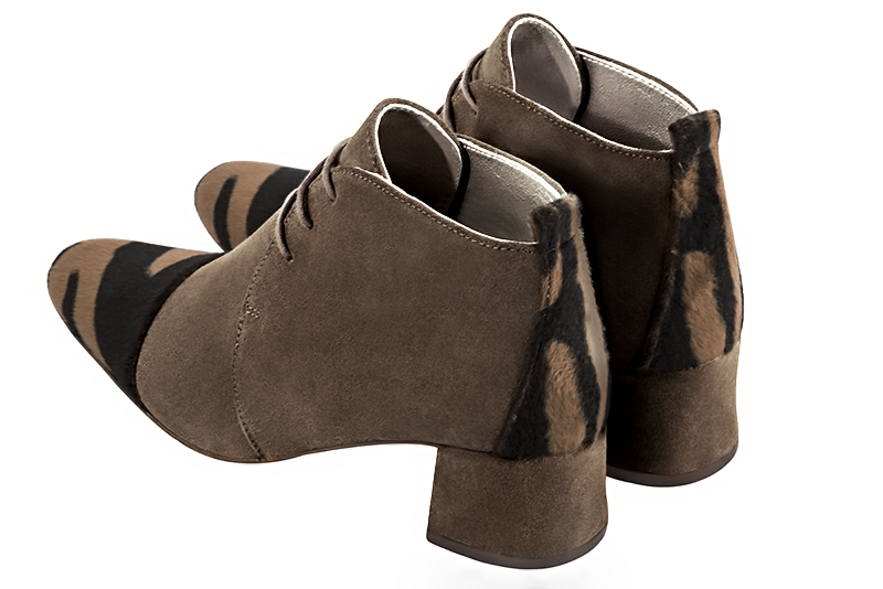 Safari black and chocolate brown women's ankle boots with laces at the front. Round toe. Low flare heels. Rear view - Florence KOOIJMAN